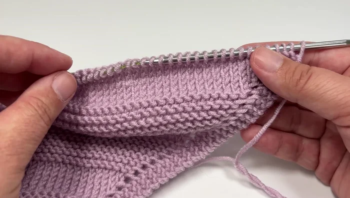 Continue alternating Garter and Stockinette decrease sections until seven stitches remain.