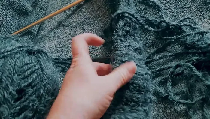 Knit the first six rows in a 2x2 ribbing pattern (two purl, two knit, repeat).