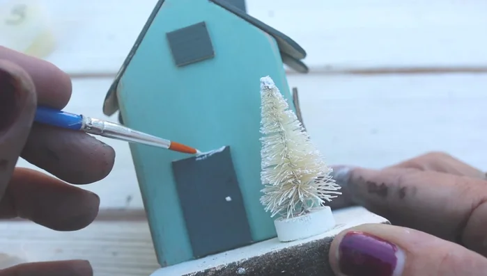 Detailing: Add details like a door handle and windows using paint.