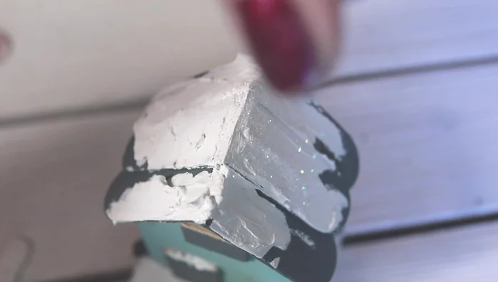 Add glitter: Apply glitter to the snow before the paint dries.