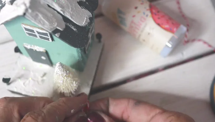 Create a fence: Tie a cord to the ends of the nails to create a fence around the house.