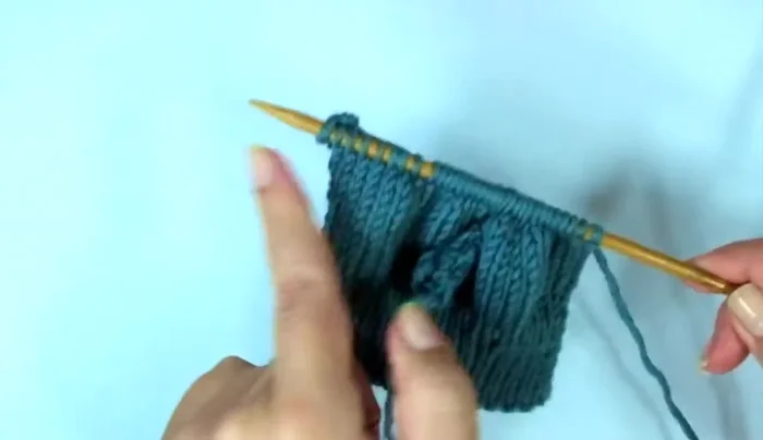 Knit nine rows in stockinette stitch (knit one row, purl one row).