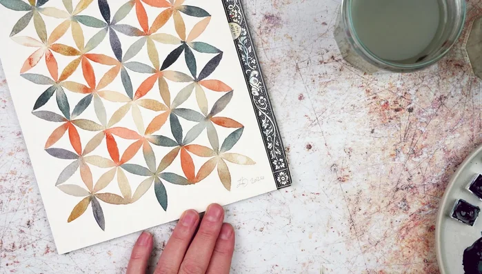 Remove remaining pencil lines once the paint is dry.