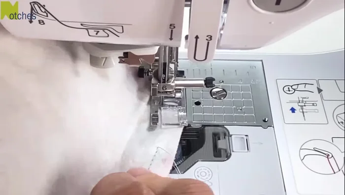 Attach crown to brim: Attach the crown to the brim, right sides facing. Stitch, being careful to match notches.