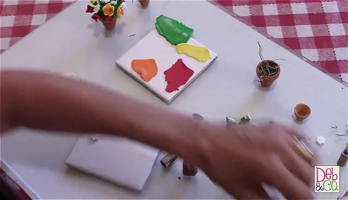 Attach wire to daisies: Turn the daisies over and attach fun wire to the back, using a small amount of glue to secure (optional, but recommended).