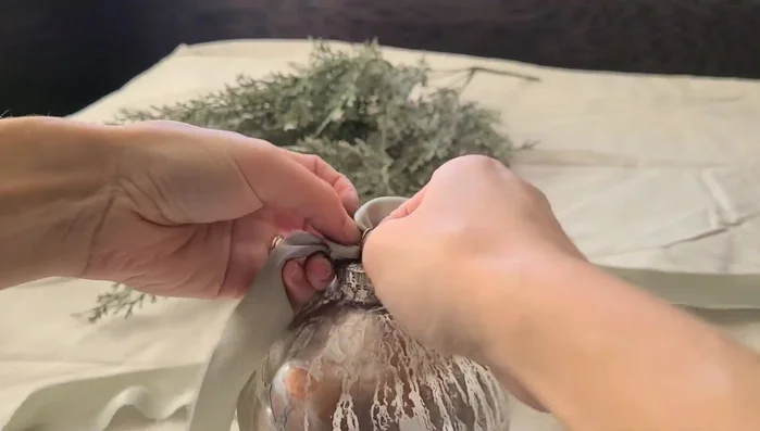 Attach ornament tops and add hangers using ribbon.