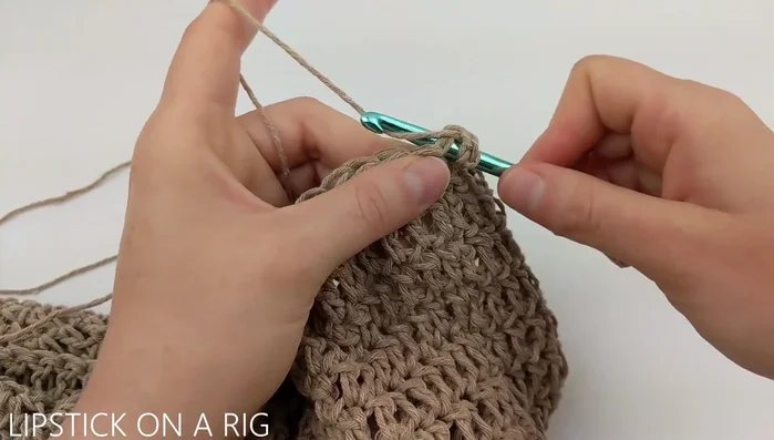 Decrease: Chain 2, dc in first 7 stitches, skip 8th stitch. Repeat around. (84 dc total). Repeat decreasing rows, decreasing the number of stitches before skip by 1 each time (72, 60, 48, 36, 24, 12 dc).