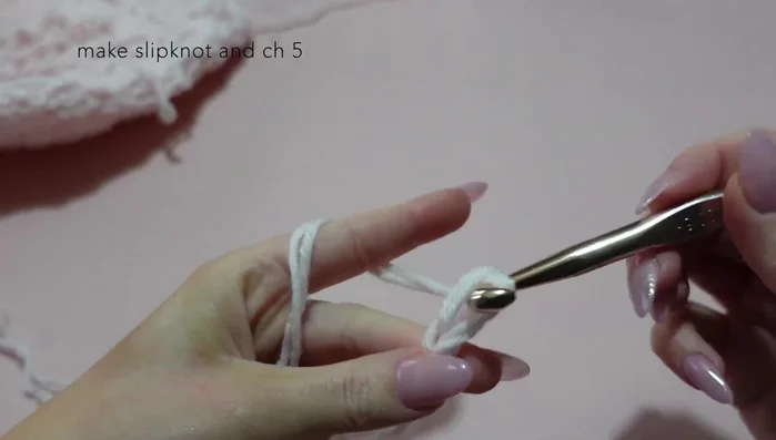 Create a small loop for hanging by chaining 5, hdc in each stitch across for 4 hdc. Continue for desired length. Sew the ends together.