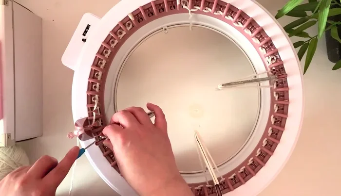 Knit 180 rows using the roll counter, handling extenders carefully.