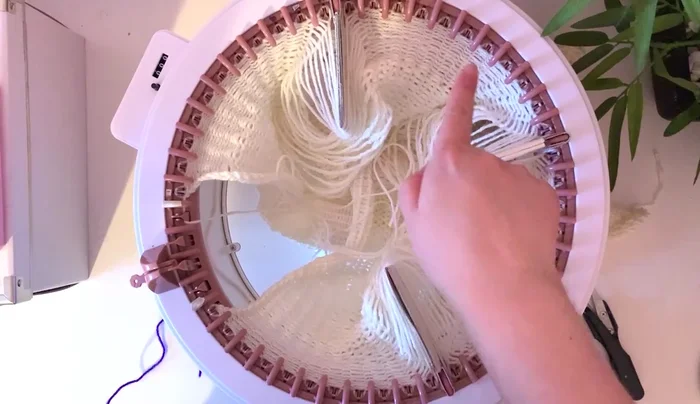 Prepare for cabling by separating strands and tightening edge stitches.