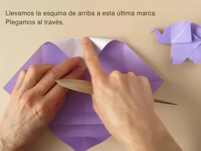 Repeat the fold on the other side.