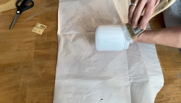Apply a second coat to the sides of the jar using the same technique as before.