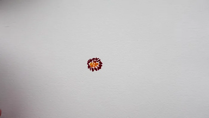 Rinse most of the pigment from your size 8 brush, keeping it wet. Use the brush tip to drag out pigment and lay down pressure to create petals. Repeat this process around the center, using about five or six petals.