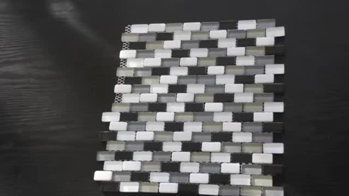 Gather materials: Purchase inexpensive glass mosaic tiles with varied shades (at least 4-5 between white and black). Secure your chosen poster to a table using tape.