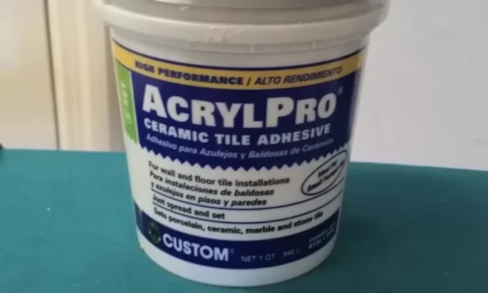 Apply adhesive: Start in one corner, applying pre-mixed tile adhesive (back-butter method recommended) to a small section. Place the tiles, ensuring straight lines and no gaps.