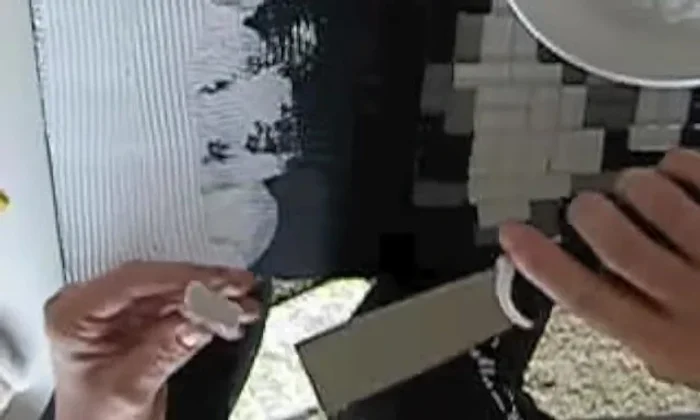 Connect to the main picture: Carefully connect the tiled areas to the main picture, adjusting tile placement as needed.