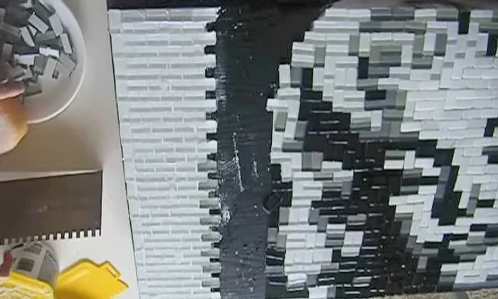 Clean and let dry: Clean up excess adhesive with a wet sponge before it dries. Allow the mosaic to dry completely overnight for best results.