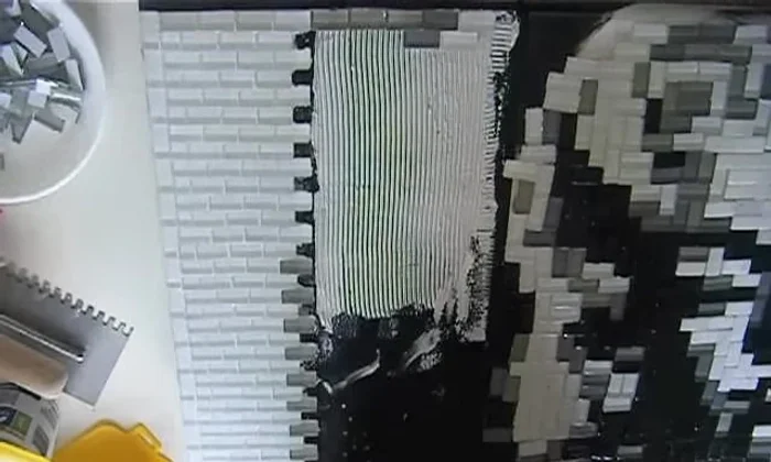 Connect to the main picture: Carefully connect the tiled areas to the main picture, adjusting tile placement as needed.