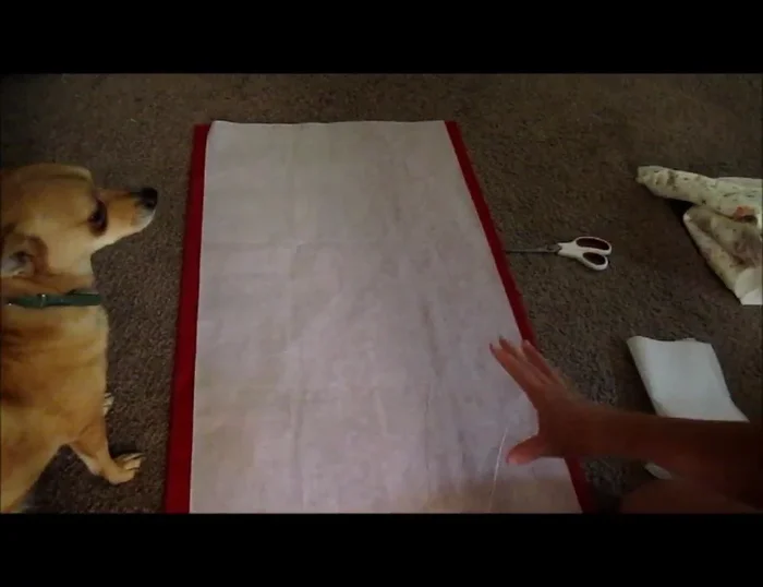 Fuse the interfacing to the back of the pocket fabric pieces.