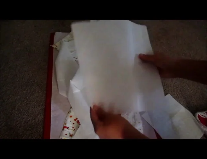 Hem the edges of the top pocket fabrics.