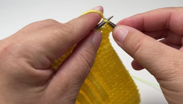 Cast off knitwise: Knit two stitches loosely, then lift the first stitch over the second. Repeat this process until only one loop remains. Cut the yarn, leaving a tail to weave in, and pull the last loop through to secure.