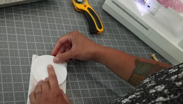 Sew Curves: Stitch along the curved edges using a scant 1/4 inch seam allowance (closer to 1/8 inch), making sure to backstitch at the beginning and end.