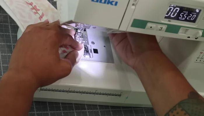 Sew Curves: Stitch along the curved edges using a scant 1/4 inch seam allowance (closer to 1/8 inch), making sure to backstitch at the beginning and end.