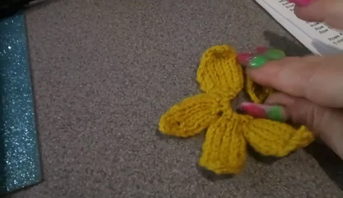 Sew a felt patch to the back to complete the brooch.