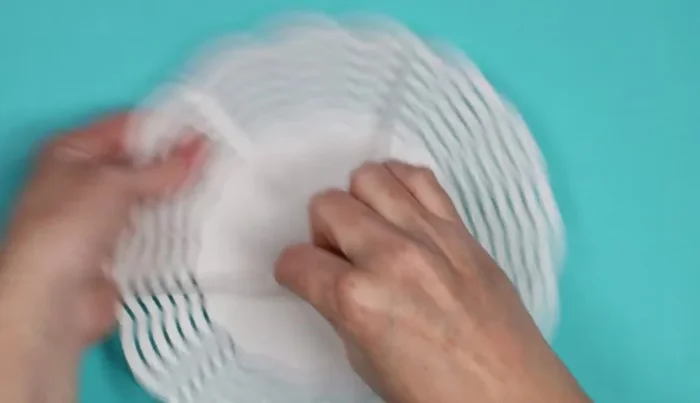 Prepare the wind spinner: Remove the protective film from both sides of the wind spinner.