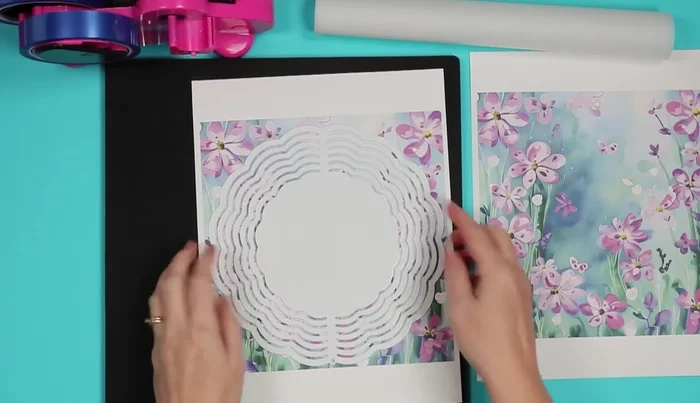 Secure the print: Use heat-resistant tape to attach the print to the wind spinner. Cover all gaps with protective paper.