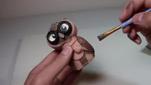 Stylized Steampunk Owl Figurine: A Beginner's Clay Sculpting Tutorial
