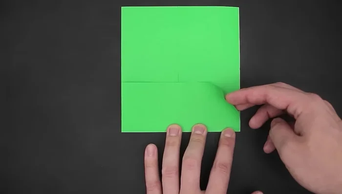 Fold the top side down, slightly beyond the middle.