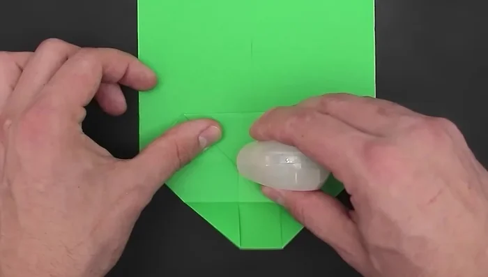 Apply glue to the four spaces at the bottom, and attach the other side.