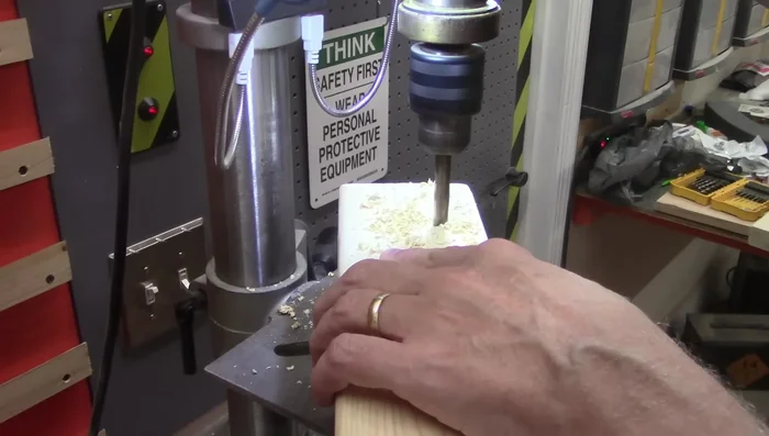 Drill holes in the header and footer boards for bolts to attach to the legs.