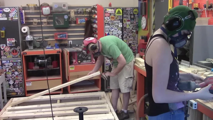 Attach the center leg (11-inch 2x4) using T-nuts and bolts.