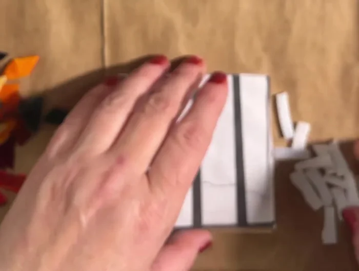 Cut glass pieces to size using wheeled nippers. Always keep your fingers away from the blades and protect your work surface with a paper bag or newspaper to catch glass shards.