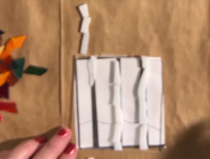 Apply glue to the back of the glass pieces and carefully place them onto the acrylic base, ensuring that the edges of the glass are flush with the edges of the base.