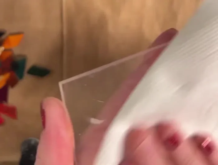 Clean the sanded surface with rubbing alcohol.