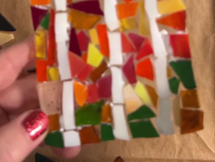 Let the glued mosaic dry for at least 24 hours in a warm area.