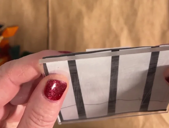 Place the template behind the acrylic square to guide the placement of glass pieces.