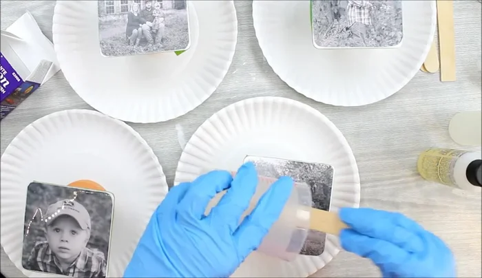 Pour and cure the resin. Pour a small amount of resin onto the coaster, then tilt the coaster to distribute it evenly and ensure complete coverage. Add more resin if necessary, but avoid excessive amounts. Use a tool to pop any bubbles. Allow the resin to cure for approximately 24 hours.