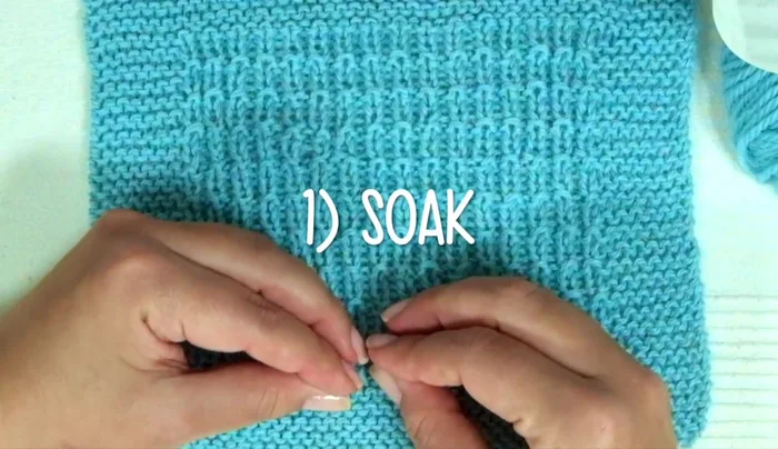 Block the blanket: soak, gently squeeze excess water, lay flat on a towel, and air dry.