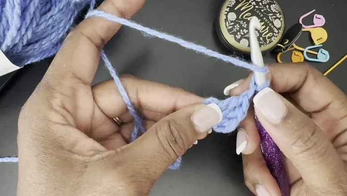 Chain 1, and repeat step 2 three more times. Slip stitch to the top of the first double crochet to join the round.