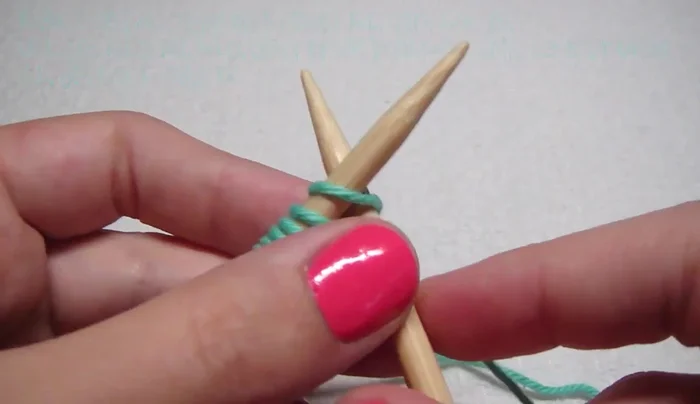 Row 2 (Wrong Side): Purl all stitches. Purl through the back loop of yarn overs.