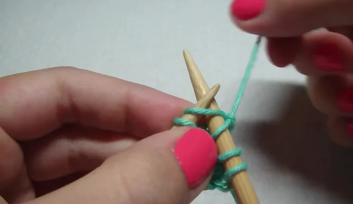 Row 2 (Wrong Side): Purl all stitches. Purl through the back loop of yarn overs.