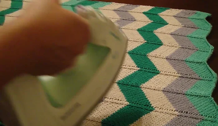 Blocking: Lightly steam-iron the finished blanket to achieve desired shape. Allow to completely cool and dry while laid flat.