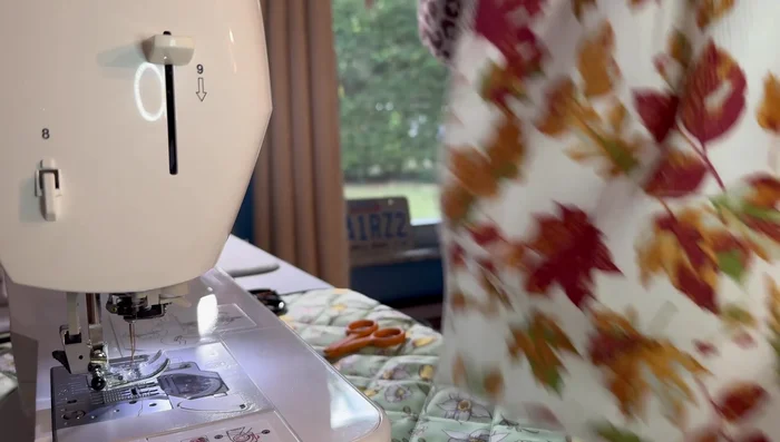 Attach a button to either the front or back of the towel, depending on your preference.