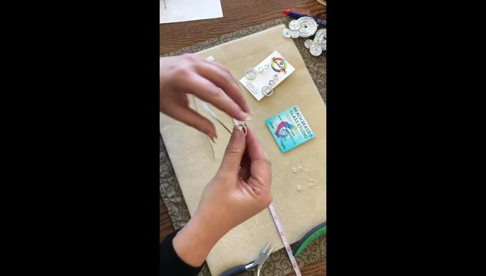 Create a second matching loop on each earring. Adjust and refine the shape until both earrings match perfectly.