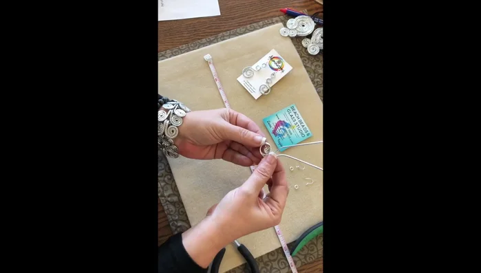 Create a second matching loop on each earring. Adjust and refine the shape until both earrings match perfectly.