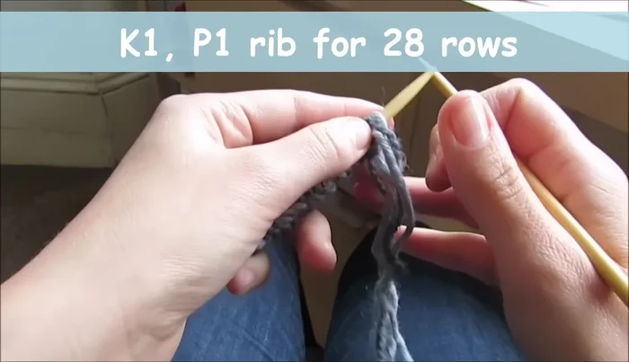 Work 28 rows in K1 P1 rib (knit one, purl one).